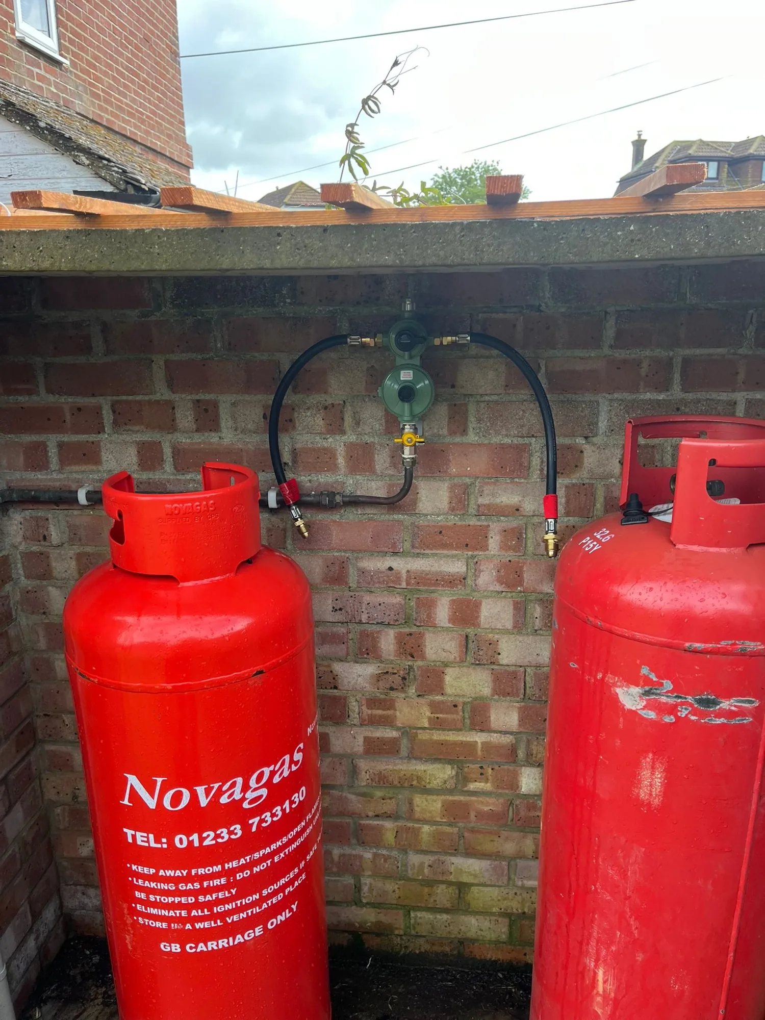 Twin LPG cylinders and changeover regulator fitted by PARAGAS
